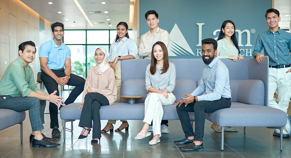 Employees in a modern, brightly lit office space